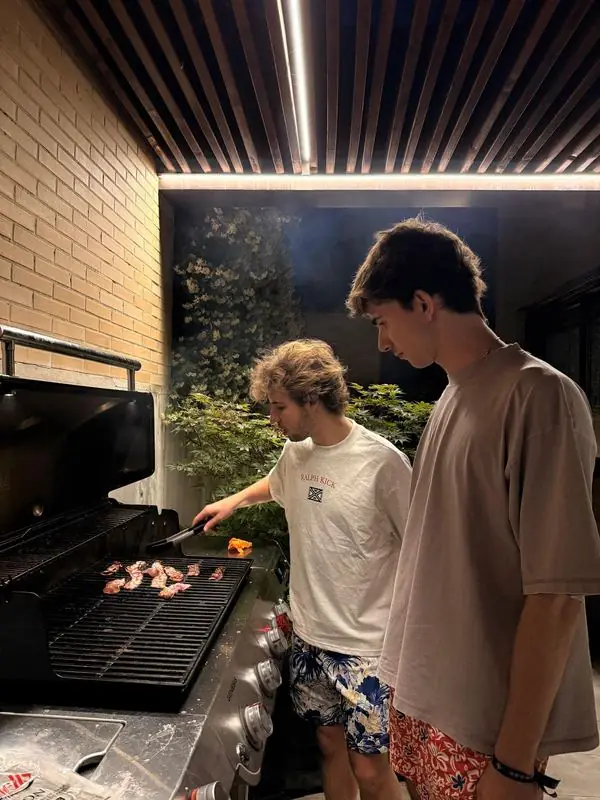 Friends in RalphKick tees at a barbecue